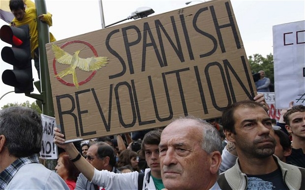 La Spagna spaventa i mercati. Borse giù e spread su. Manifestazioni a Madrid e Atene