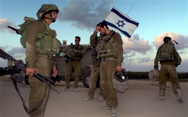 Israele, pronta l’invasione a Gaza. Raid aerei, 14 morti, tra cui 2 bambini. IL VIDEO